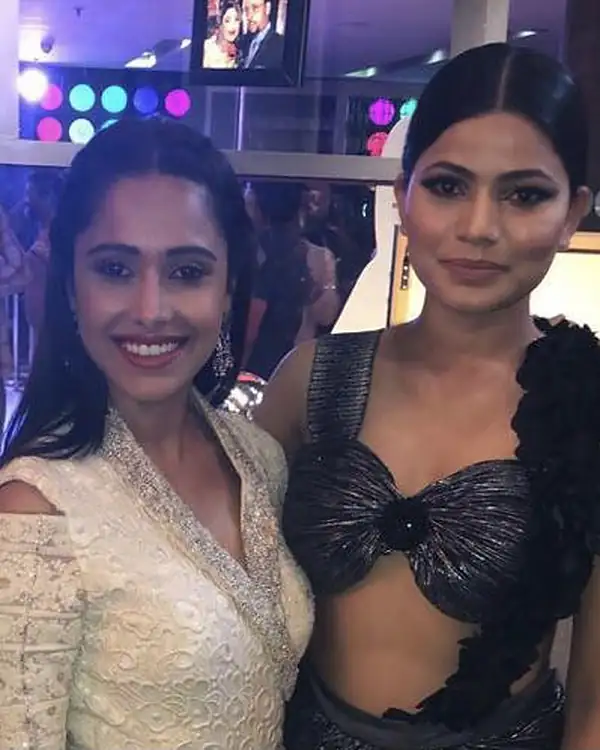 Client with the artist at an event