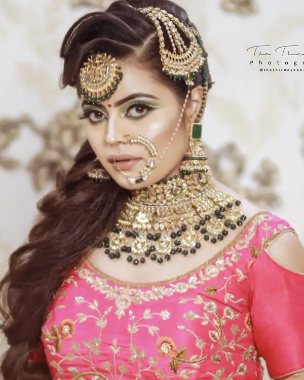 Bridal make-up, pink lehenga, gold jewellery